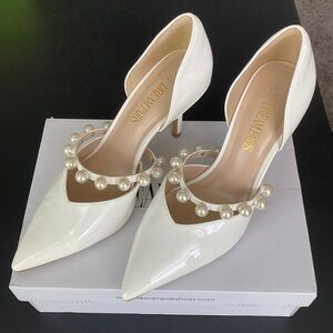 White bridal heels with detachable pearl strap